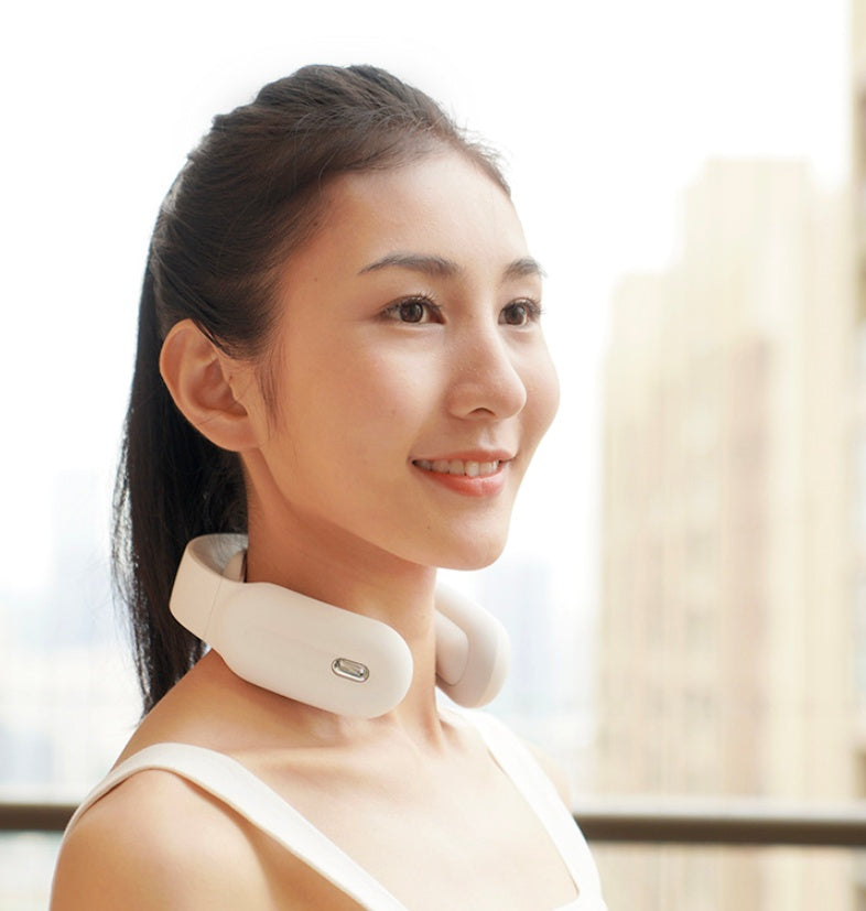 NeckGlow™ – Masseur Cervical Intelligent. Massage chauffant et relaxation du cou à domicile.